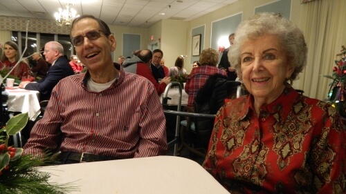 Rusty and Peggy enjoying their first Holiday Party at Homeland Center. Peggy and her son Rusty